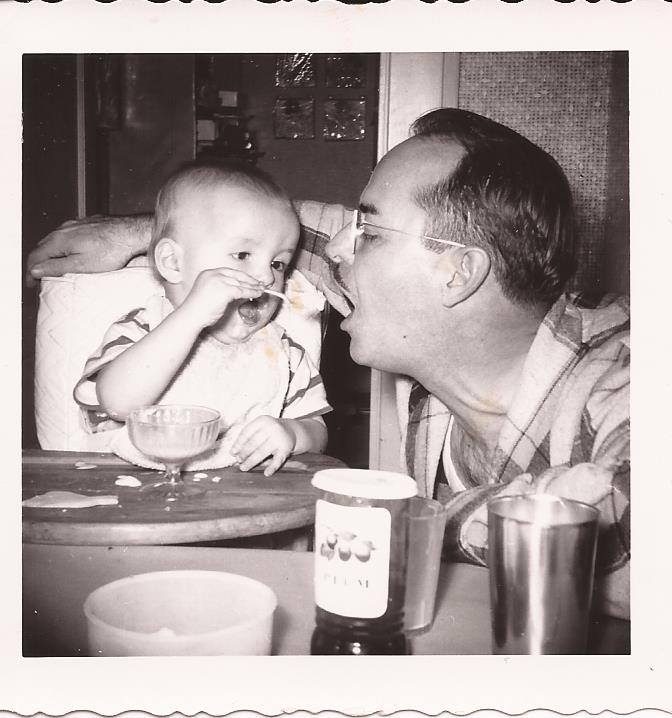 Dad feeding Grandpa as a baby